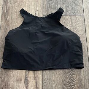 A Lululemon workout top in black and very good condition with removable bra pads